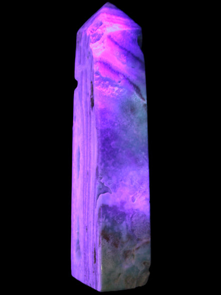 Caribbean Calcite aqua blue obelisk 170mm 539g in UV light - Rocks and Things Store