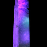 Caribbean Calcite aqua blue obelisk 170mm 539g in UV light - Rocks and Things Store