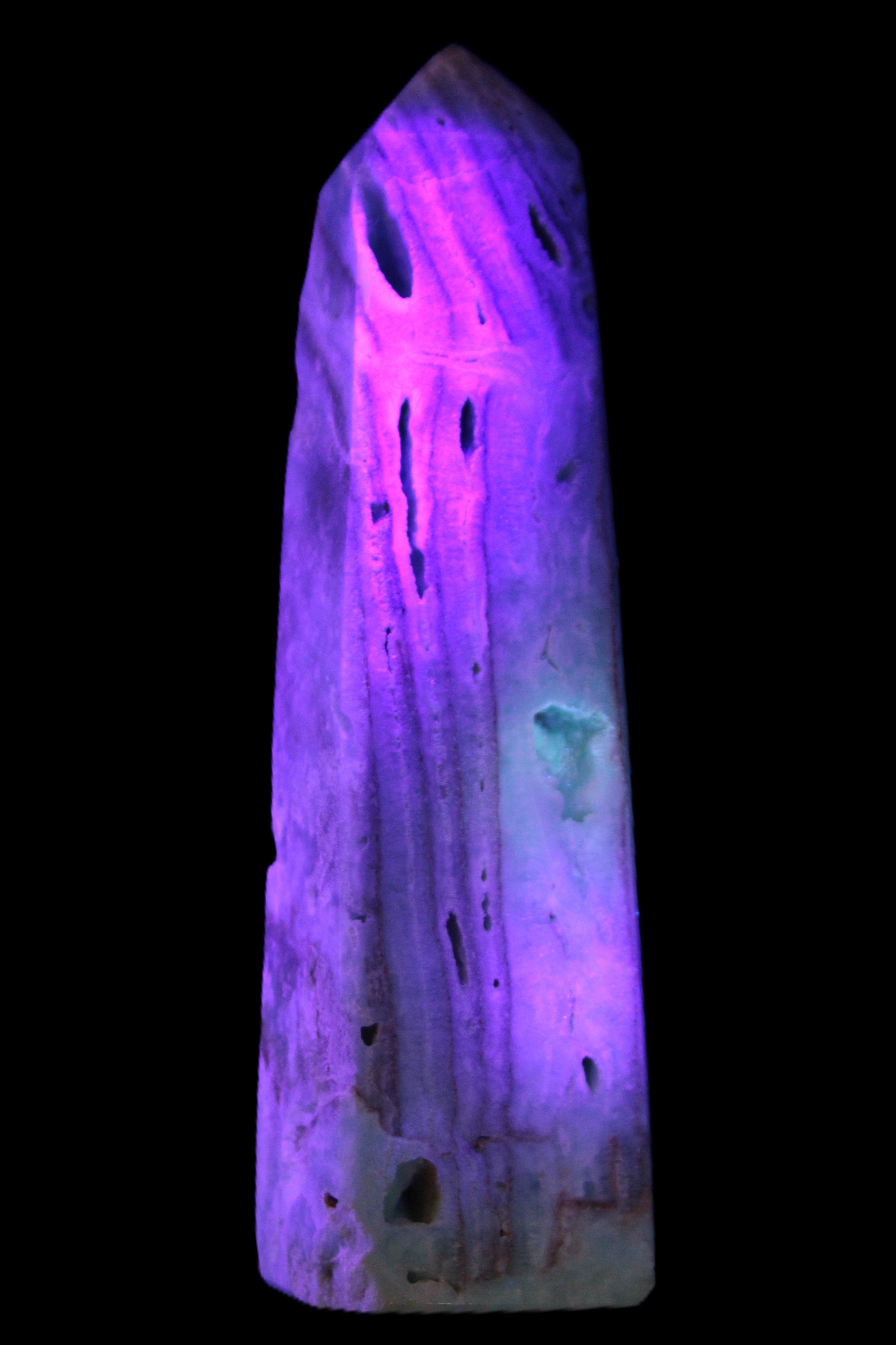 Caribbean Calcite aqua blue obelisk 170mm 539g in UV light - Rocks and Things Store