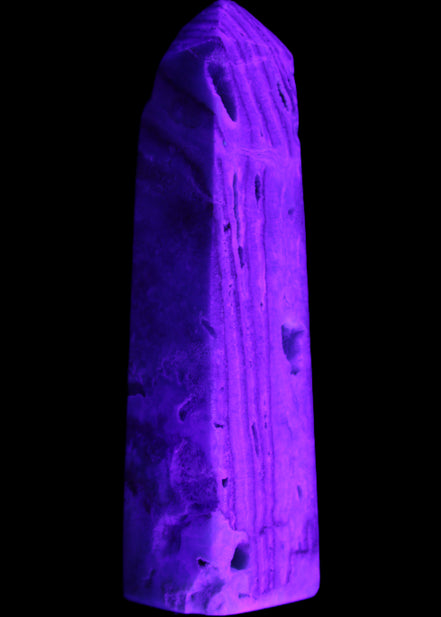 Caribbean aqua blue Calcite obelisk 539g in UV light - Rocks and Things Store
