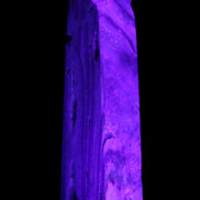 Caribbean aqua blue Calcite obelisk 539g in UV light - Rocks and Things Store
