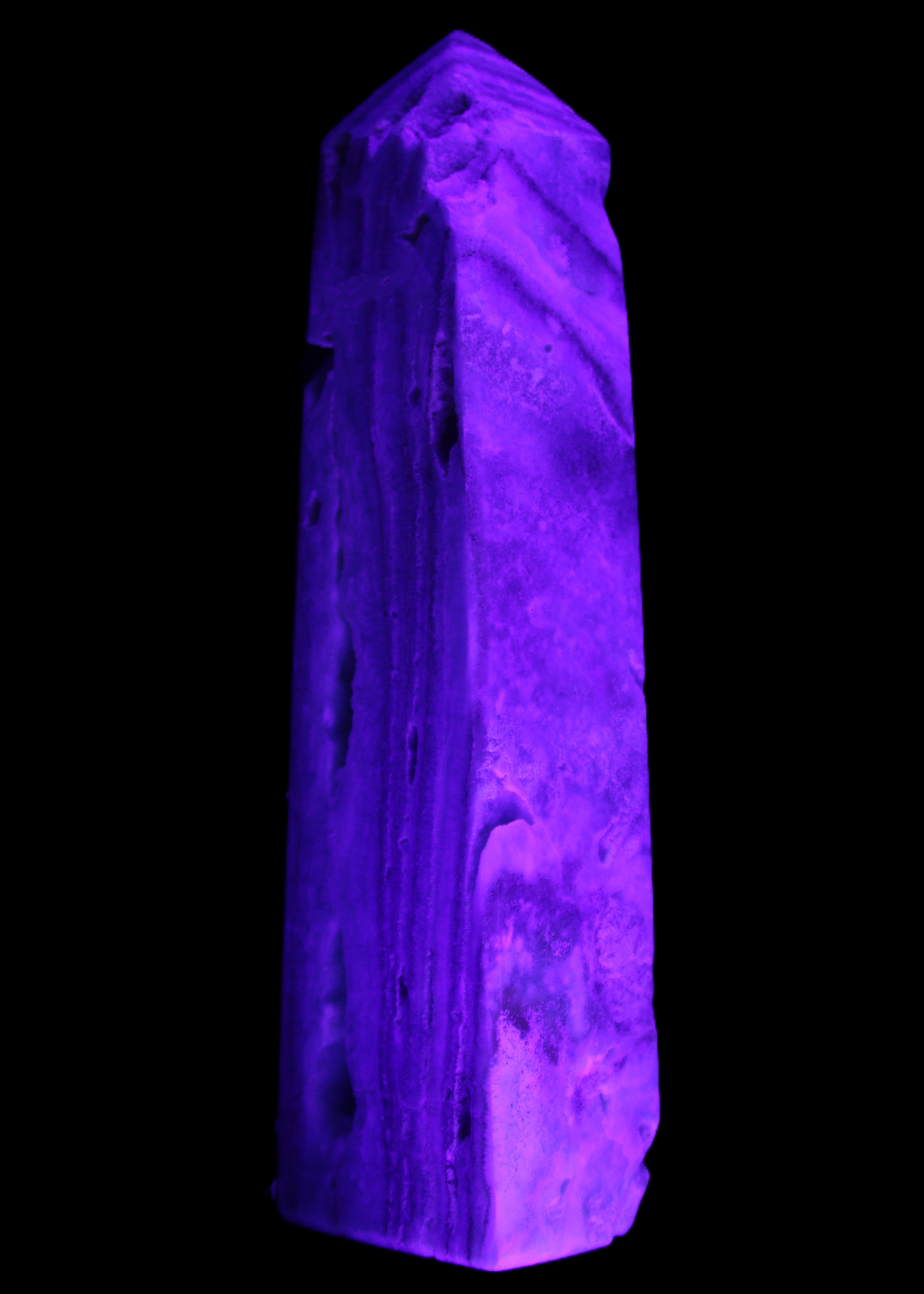 Caribbean aqua blue Calcite obelisk 539g in UV light - Rocks and Things Store