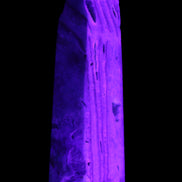 Caribbean aqua blue Calcite obelisk 539g in UV light - Rocks and Things Store