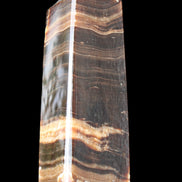 Chocolate Calcite obelisk 120*40*30mm 359g in sunlight - Rocks and Things Store