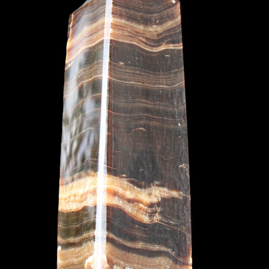 Chocolate Calcite obelisk 120*40*30mm 359g in sunlight - Rocks and Things Store