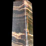 Chocolate Calcite obelisk 120*40*30mm 359g in sunlight - Rocks and Things Store