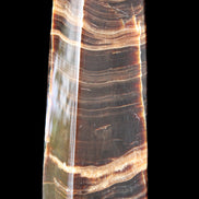 Chocolate Calcite obelisk 120*40*30mm 359g in sunlight - Rocks and Things Store