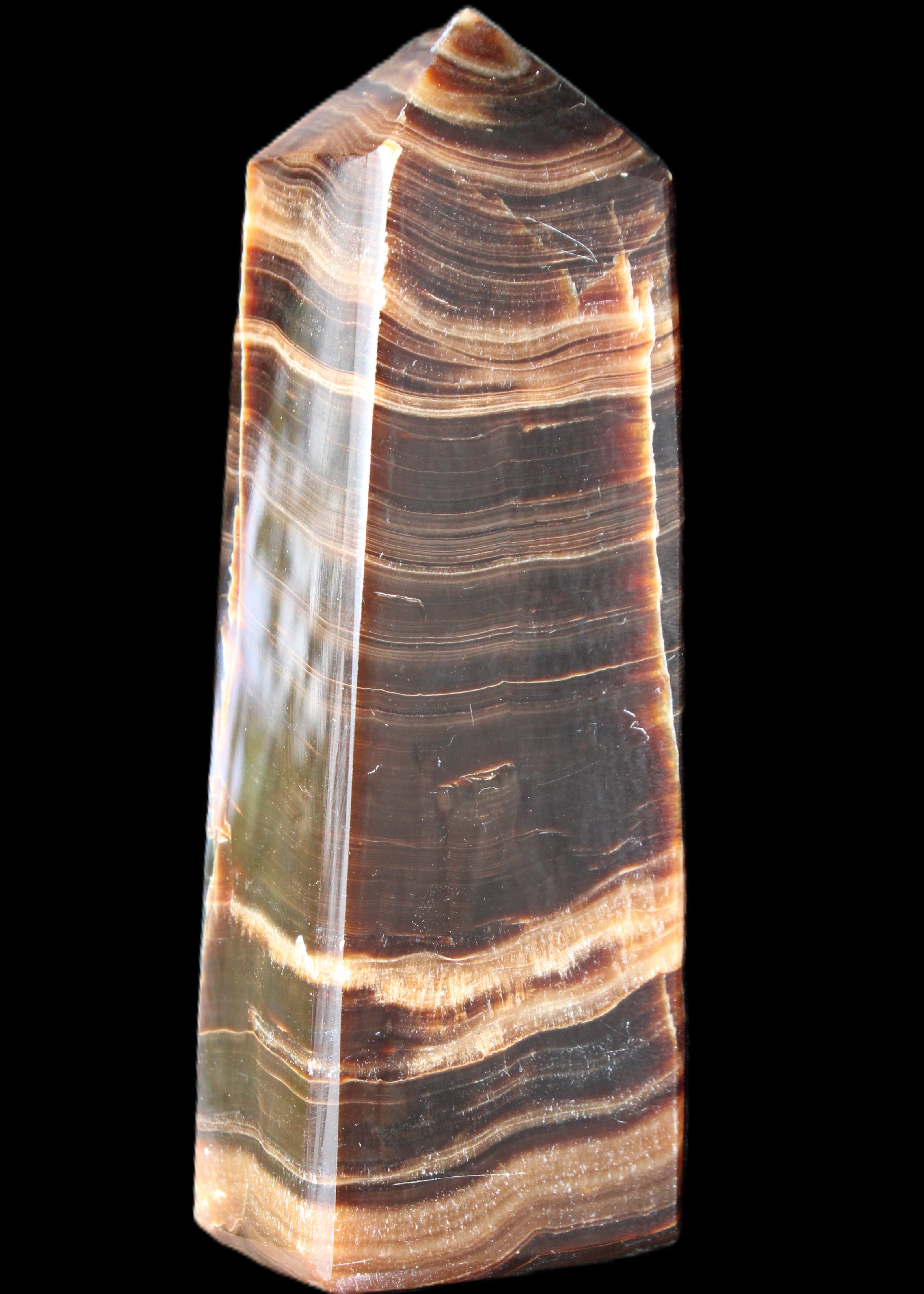 Chocolate Calcite obelisk 120*40*30mm 359g in sunlight - Rocks and Things Store