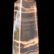 Chocolate Calcite obelisk 120*40*30mm 359g in sunlight - Rocks and Things Store