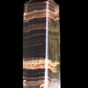 Chocolate Calcite obelisk 120*40*30mm 359g in sunlight - Rocks and Things Store