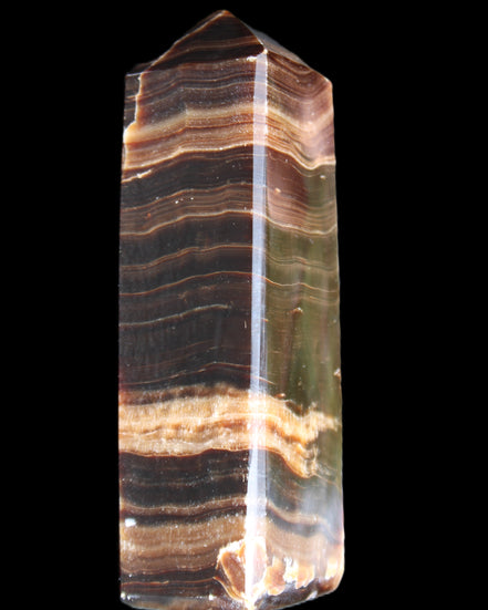 Chocolate Calcite obelisk 120*40*30mm 359g in sunlight - Rocks and Things Store