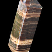 Chocolate Calcite obelisk 120*40*30mm 359g in sunlight - Rocks and Things Store