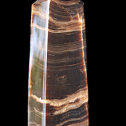 Chocolate Calcite obelisk 120*40*30mm 359g in sunlight - Rocks and Things Store