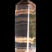 Chocolate Calcite obelisk 120*40*30mm 359g in sunlight - Rocks and Things Store