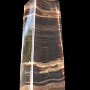 Chocolate Calcite obelisk 120*40*30mm 359g in sunlight - Rocks and Things Store