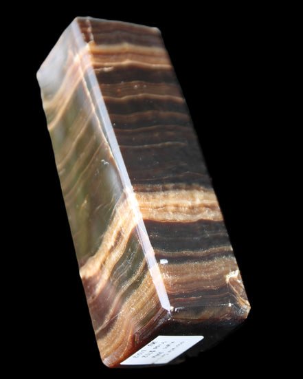 Chocolate Calcite obelisk 120*40*30mm 359g in sunlight - Rocks and Things Store