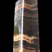 Chocolate Calcite obelisk 120*40*30mm 359g in sunlight - Rocks and Things Store