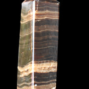 Chocolate Calcite obelisk 120*40*30mm 359g in sunlight - Rocks and Things Store