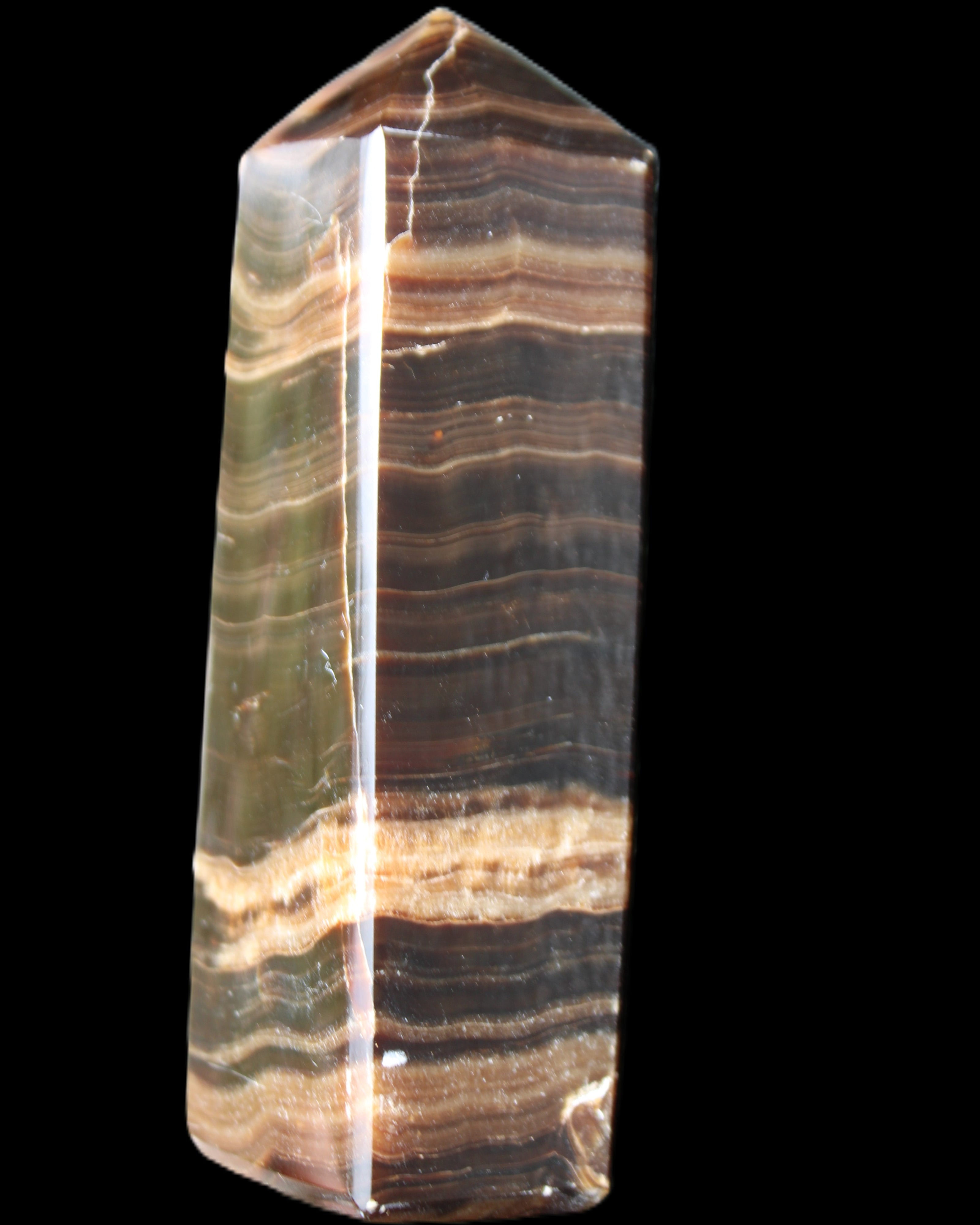 Chocolate Calcite obelisk 120*40*30mm 359g in sunlight - Rocks and Things Store