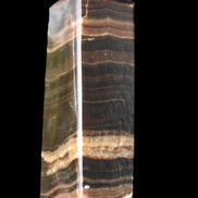 Chocolate Calcite obelisk 120*40*30mm 359g in sunlight - Rocks and Things Store