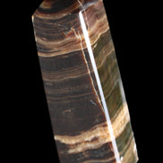 Chocolate Calcite obelisk 120*40*30mm 359g in sunlight - Rocks and Things Store
