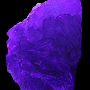 Stepped Clear, Blue and Purple Fluorite cluster 185*135*79mm 1349g in UV light - Rocks and Things Store