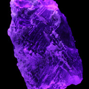 Fluorite snow steppes 137*55*65mm 1080g in UV light - Rocks and Things Store
