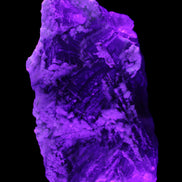 Fluorite snow steppes 137*55*65mm 1080g in UV light - Rocks and Things Store