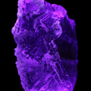 Fluorite snow steppes 137*55*65mm 1080g in UV light - Rocks and Things Store
