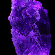 Fluorite snow steppes 137*55*65mm 1080g in UV light - Rocks and Things Store