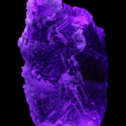 Fluorite snow steppes 137*55*65mm 1080g in UV light - Rocks and Things Store