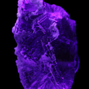 Fluorite snow steppes 137*55*65mm 1080g in UV light - Rocks and Things Store