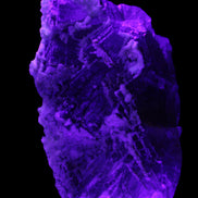 Fluorite snow steppes 137*55*65mm 1080g in UV light - Rocks and Things Store