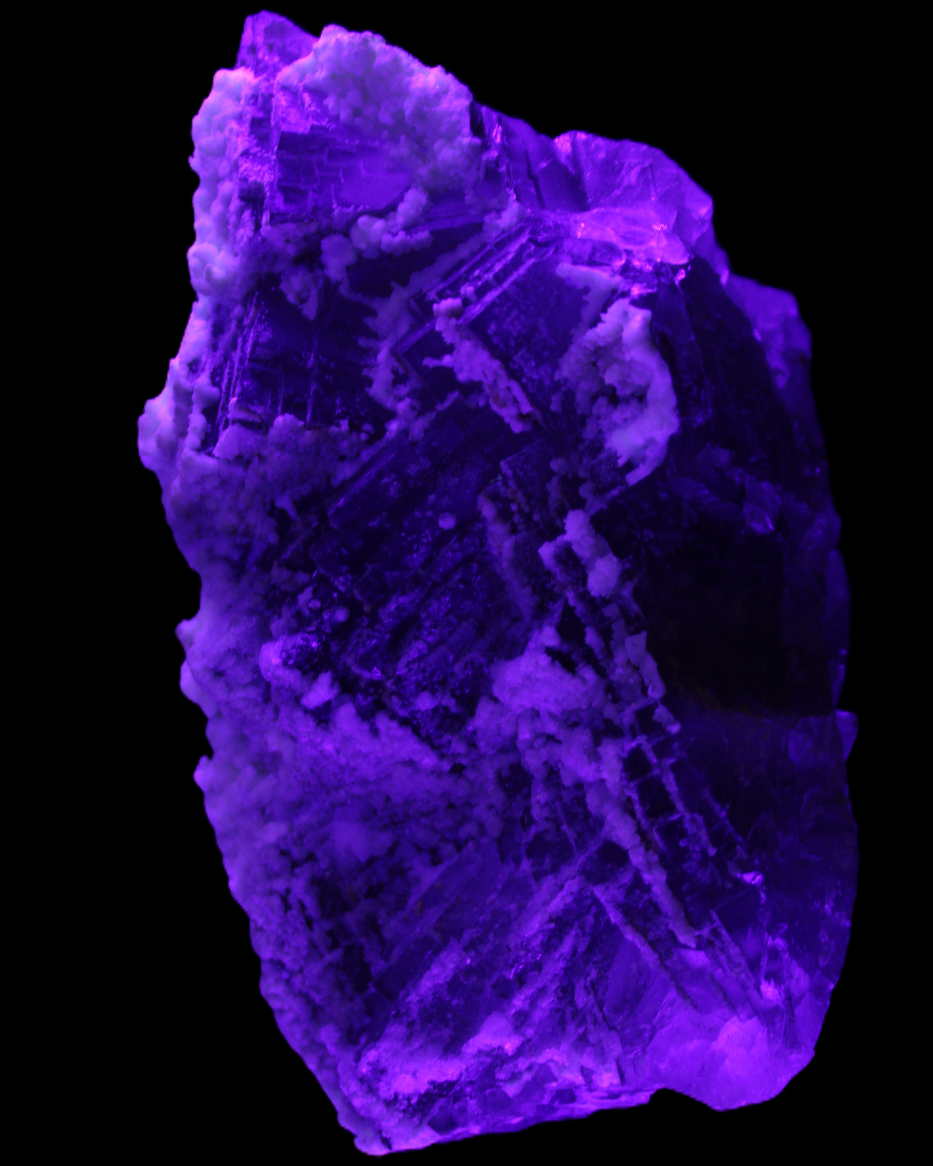 Fluorite snow steppes 137*55*65mm 1080g in UV light - Rocks and Things Store