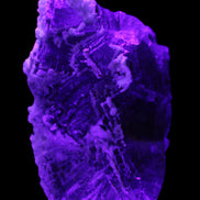 Fluorite snow steppes 137*55*65mm 1080g in UV light - Rocks and Things Store
