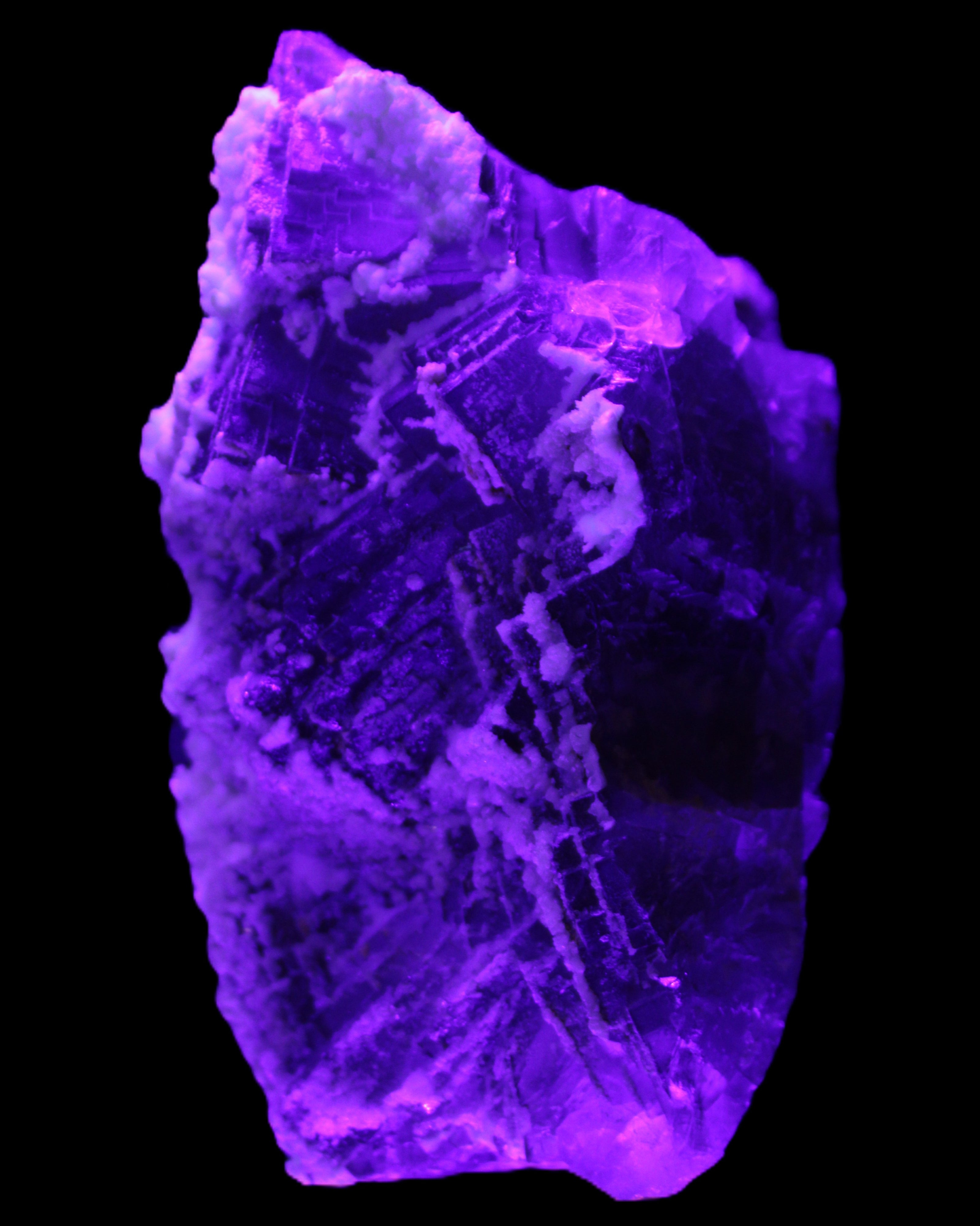 Fluorite snow steppes 137*55*65mm 1080g in UV light - Rocks and Things Store