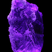 Fluorite snow steppes 137*55*65mm 1080g in UV light - Rocks and Things Store