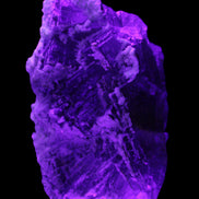 Fluorite snow steppes 137*55*65mm 1080g in UV light - Rocks and Things Store