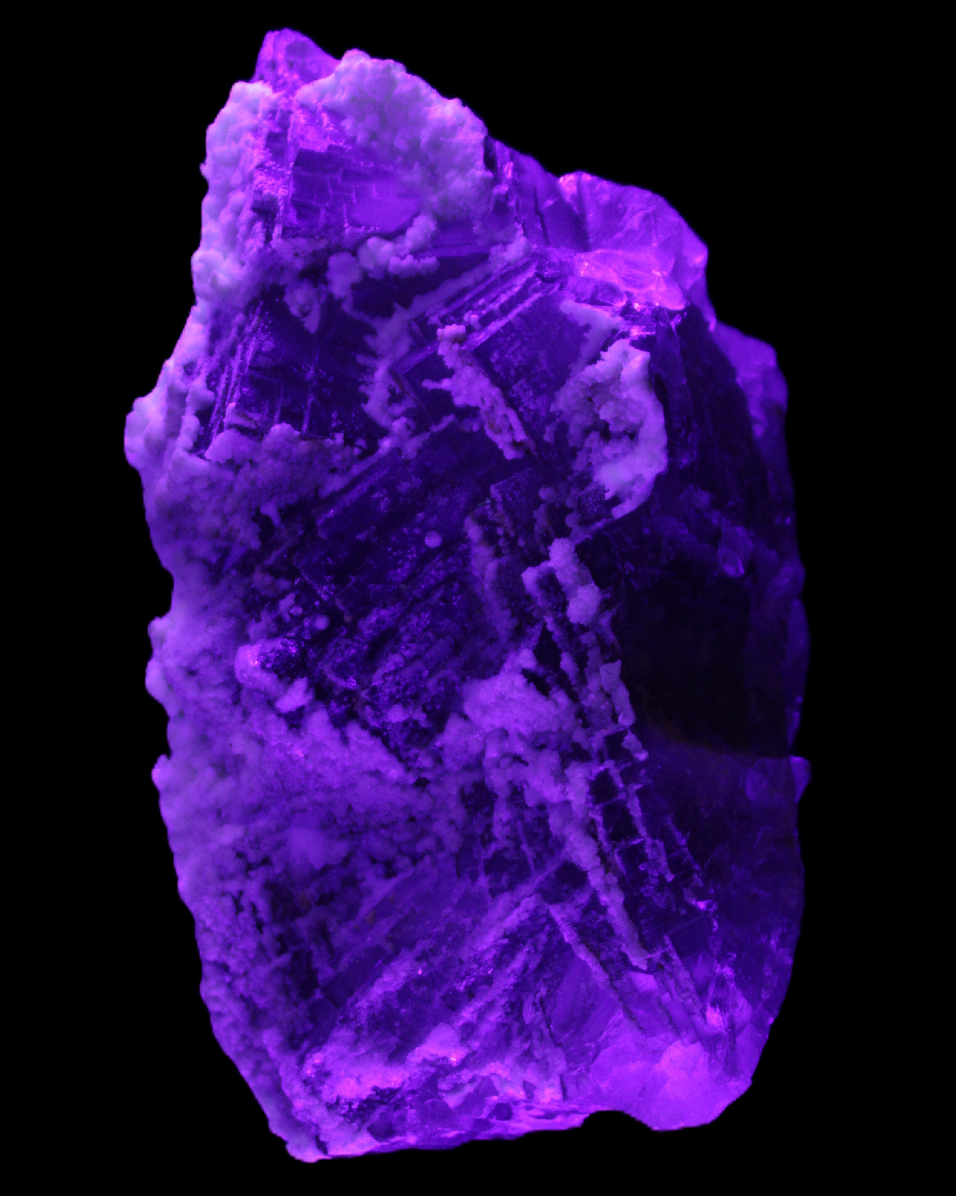 Fluorite snow steppes 137*55*65mm 1080g in UV light - Rocks and Things Store