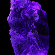 Fluorite snow steppes 137*55*65mm 1080g in UV light - Rocks and Things Store