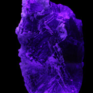 Fluorite snow steppes 137*55*65mm 1080g in UV light - Rocks and Things Store