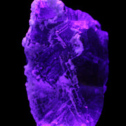 Fluorite snow steppes 137*55*65mm 1080g in UV light - Rocks and Things Store