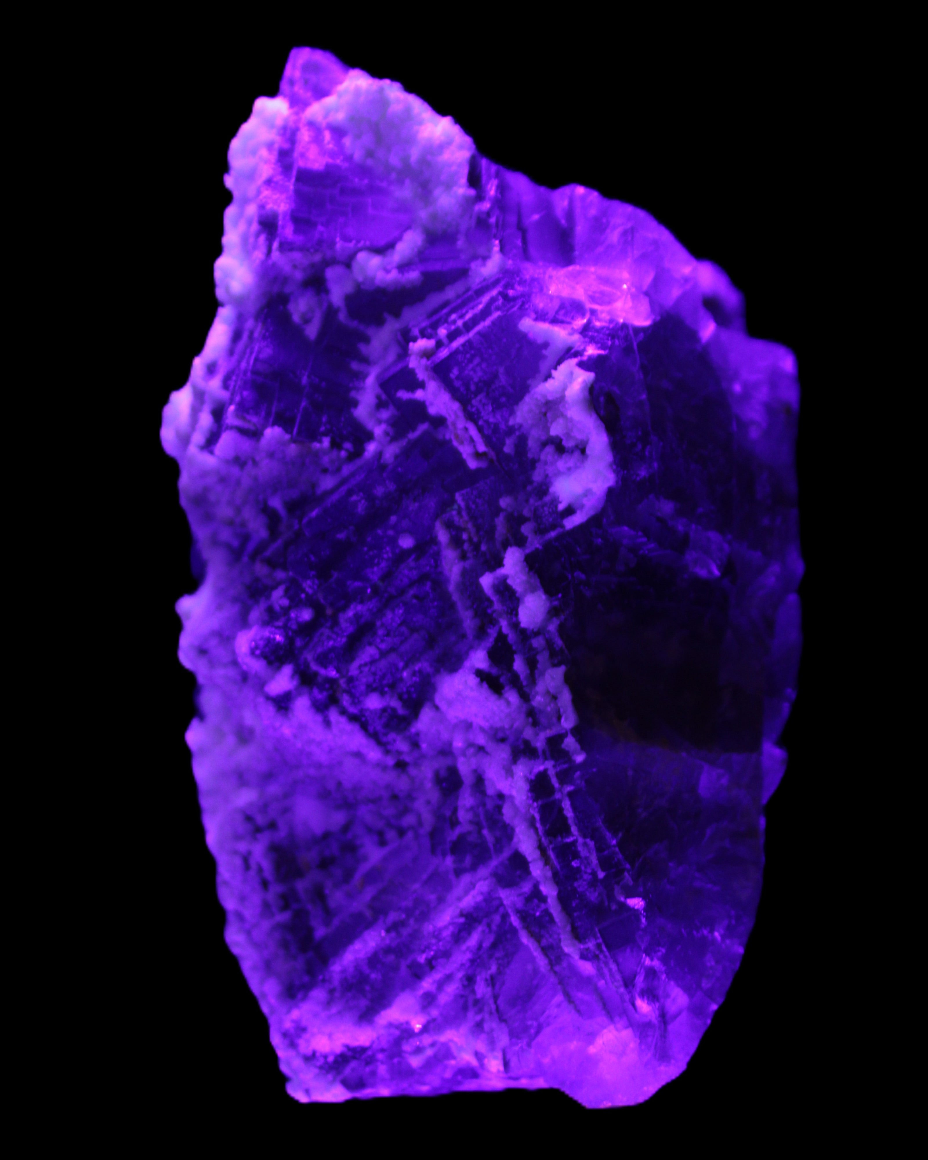 Fluorite snow steppes 137*55*65mm 1080g in UV light - Rocks and Things Store