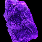 Fluorite snow steppes 137*55*65mm 1080g in UV light - Rocks and Things Store