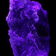 Fluorite snow steppes 137*55*65mm 1080g in UV light - Rocks and Things Store