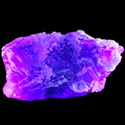 Fluorite snow steppes 137*55*65mm 1080g in UV light - Rocks and Things Store