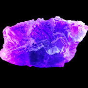 Fluorite snow steppes 137*55*65mm 1080g in UV light - Rocks and Things Store