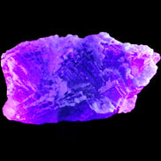 Fluorite snow steppes 137*55*65mm 1080g in UV light - Rocks and Things Store
