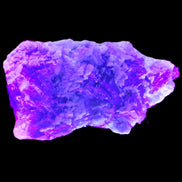 Fluorite snow steppes 137*55*65mm 1080g in UV light - Rocks and Things Store