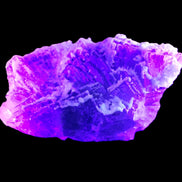 Fluorite snow steppes 137*55*65mm 1080g in UV light - Rocks and Things Store